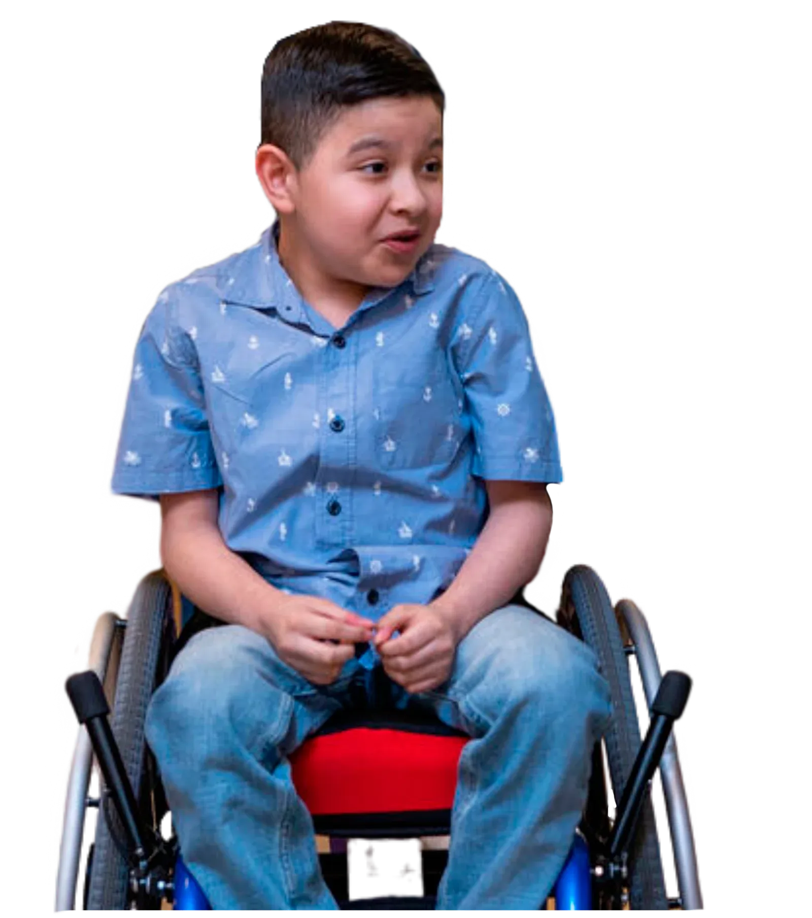 Niño con Distrofia Muscular de Duchenne sentado en su silla de ruedas
